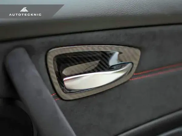 AUTOTECKNIC DRY CARBON INTERIOR DOOR HANDLE TRIM SET – E82 1M | 1-SERIES